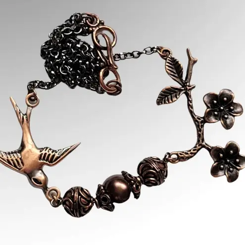 Hummingbird Antique copper floral necklace
