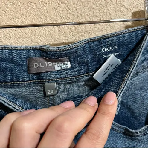 DL1961 Cecilia classic mid rise distressed denim jean shorts