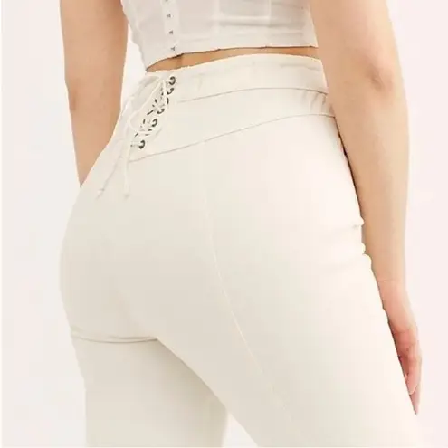 Free People  we the free Crvy Super High Rise Lace Up super flare Jeans size 34