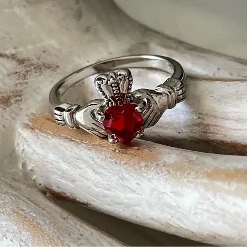 Sterling Silver Claddagh Ring with Garnet Heart Stone