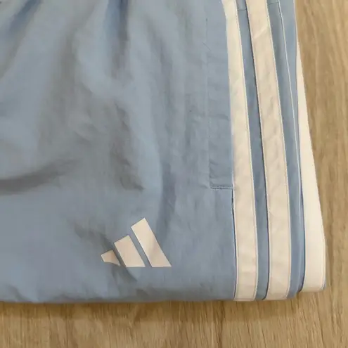 Adidas NWT  Essentials 3-Stripes Woven 7/8 Sportswear Pants | Glow Blue | 2X