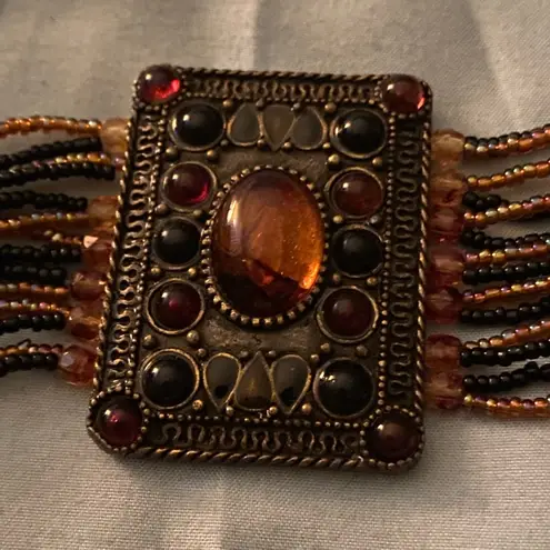 Vintage 9.25” Bracelet Multi Strand Beaded Rectangle Medallion 2” H Orange Black Gold