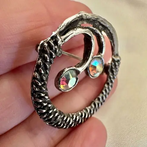 Silver tone and rhinestone vintage circle abstract brooch