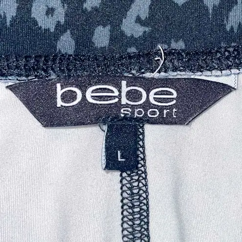 Bebe  sport leopard print joggers size L