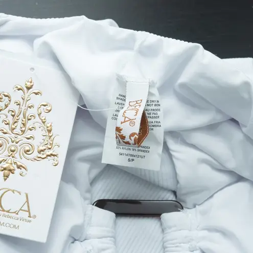 Becca . Modern Edge Cutout Ribbed One-Piece Swimsuit.