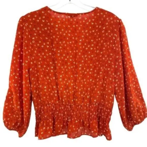 Stella Luce Floral Peplum Blouse