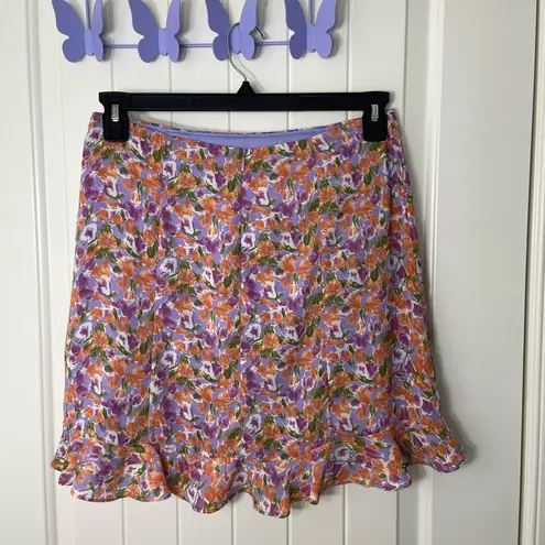 NWOT Fore women’s purple orange floral lined zip mini ruffle hem skirt summer M Size M
