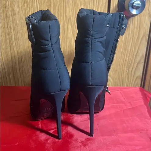 Jennifer Lopez  Black Quilted Heeled Boots