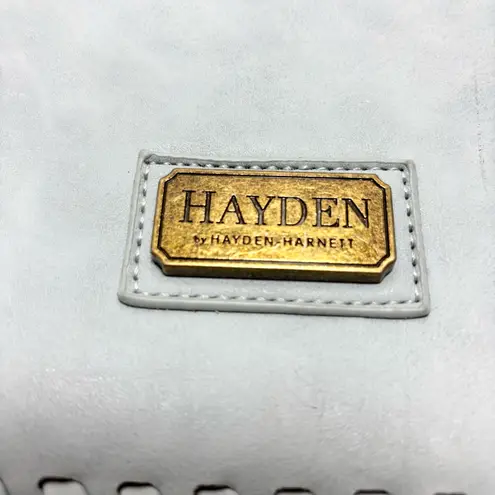 Hayden Harnett crossbody bag in a light blue shade with whipstitch detailing