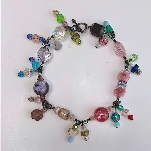 Handmade pink and purple fairycore bracelet glass and crystal dangling beads