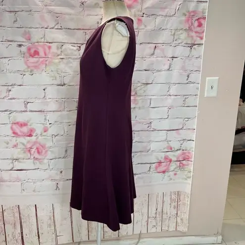 Carlisle New York sleeveless purple a line dress with zippers on pleats of hemli