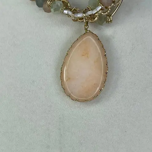 Multi layered faceted pastel stones with a teardrop peach decor boutique Gold