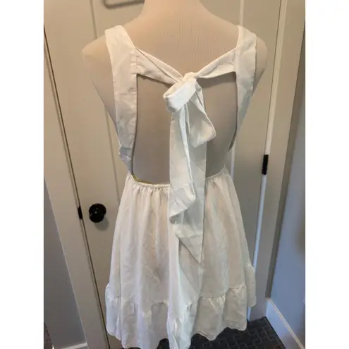 White Mini Dress V Neck Sleeveless Tie Back Ruffle Hem Summer Party White