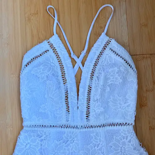 Revolve by the way. Rory Lace Romper in White
