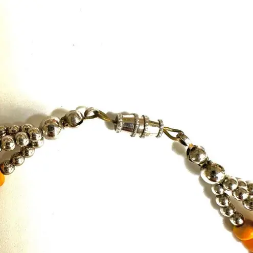 Orange yellow and purple beaded multi strand necklace