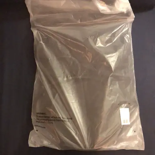 NWT RAINS Spin Rolltop Mini Bucket Bag Backpack Waterproof Everyday Use Outdoor Black