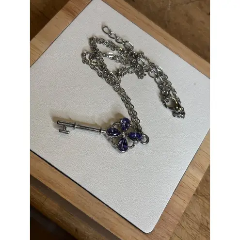 Silver Key Pendant Necklace With Purple Gemstone Accents & Chain