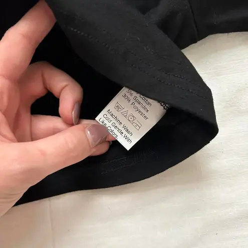 Black and white long sleeve crop top with chinoiserie inspired details