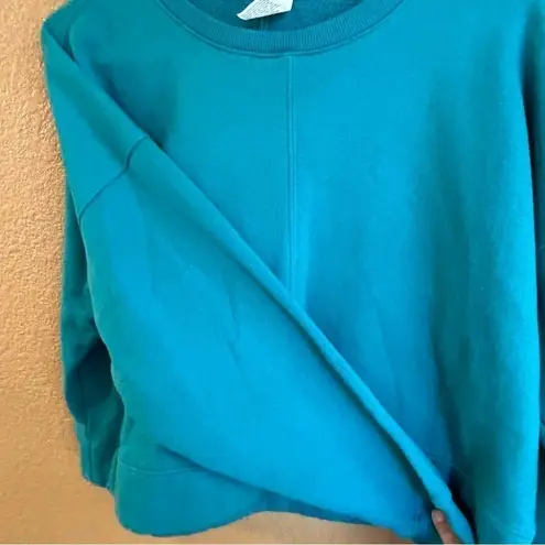 All In Motion  Lot-two cropped sweatshirts in size xs in both teal and hot pink