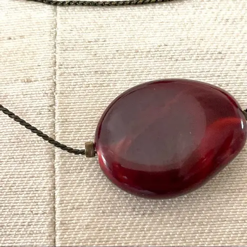 Multi strand floating bead necklace