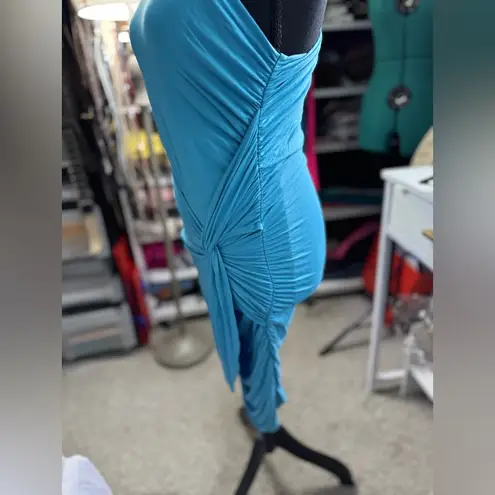 Tart Asymmetrical dress made from a vibrant blue stretch fabric. Its one-shoulder