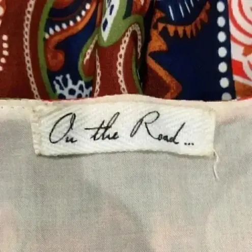 Anthropologie ⭐️  on the road boho orange brown and green blouse in size small