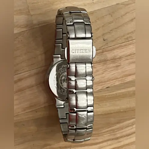 Citizen Eco-Drive Ladies Watch Black Dial WR100 Date Window Stainless Bracelet