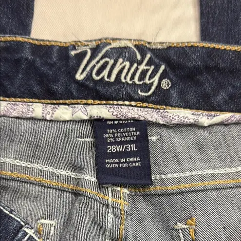 Vanity Blue Boot Cut Jeans with Subtle Fading Size undefined