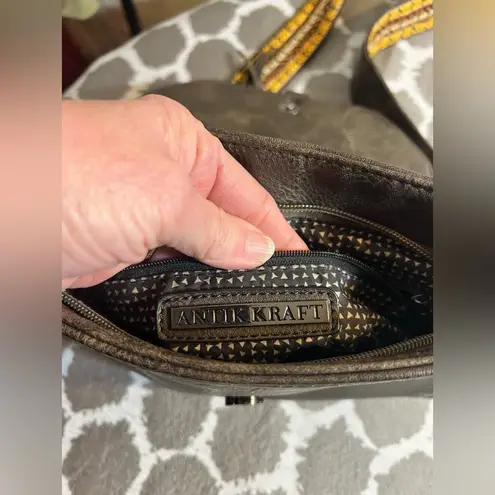 Antik Kraft Brown and Yellow Crossbody Bag with Tassel Detail and guitar strap