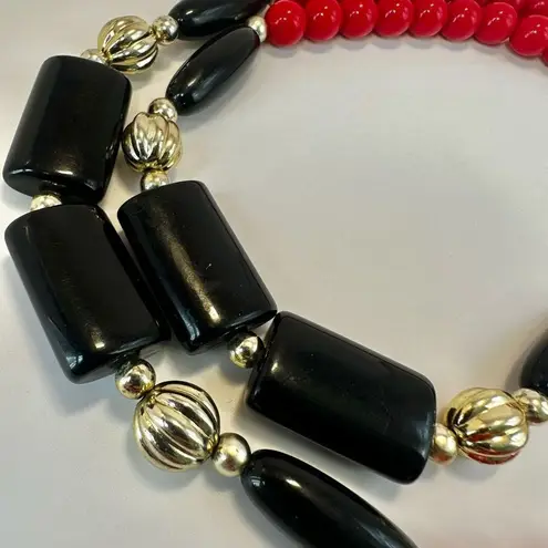 Red black and gold tone long beaded vintage necklace