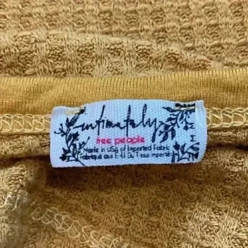 Free People Intimately  mustard yellow crop top in size medium