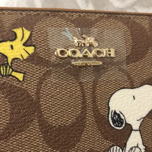 Coach  X Peanuts Long Zip Around Wallet In Signature Canvas Snoopy Woodstock