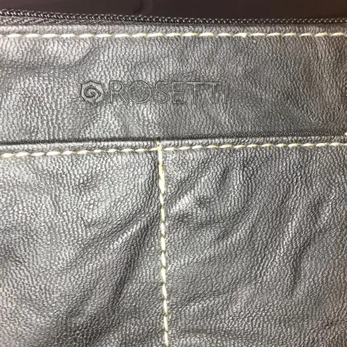 Rosetti wristlet in black faux leather new condition