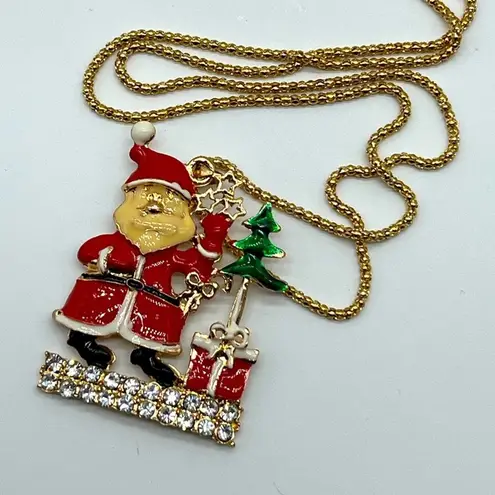 New without tags red and white crystal and enamel Santa Claus Christmas necklace
