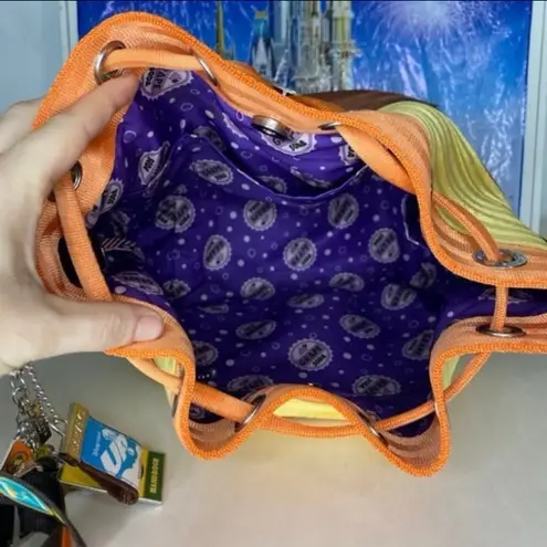 Disney parks x Harvey’s Pixar UP! Wilderness explorer park hopper purse backpack Yellow