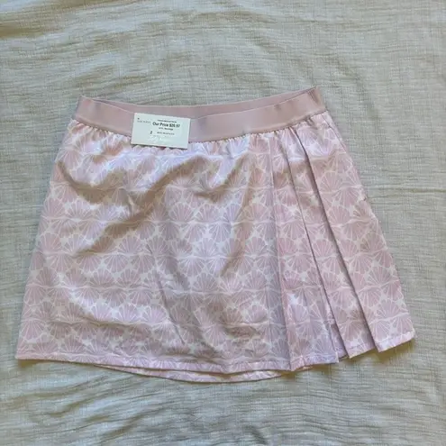 Lady Hagen NWT  16 inch Side pleated Pink and White Seashell golf skort.‎ Size M