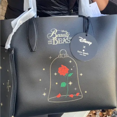 Kate Spade Authentic  Reversible leather Beauty and the beast  tote/Wristlet