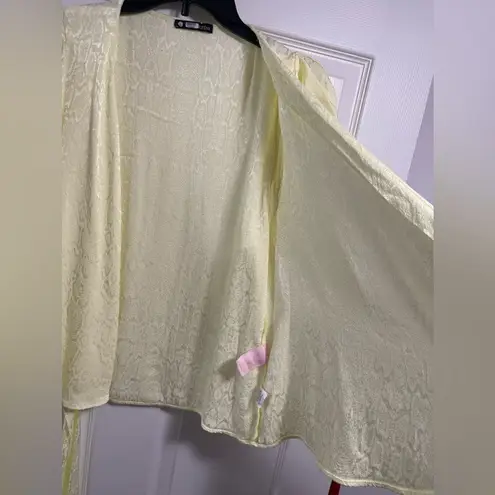 Krisa Women’s Puff Sleeve Wrap Top Daisy in Yellow color Size L