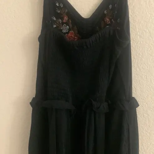 American Eagle romper | size medium | black with red flower embroidered