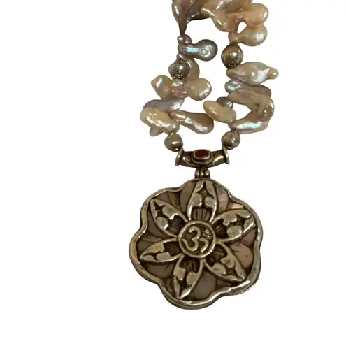 Keshi pearl & sacred OM mandala w/ unique charms along the string of pearls