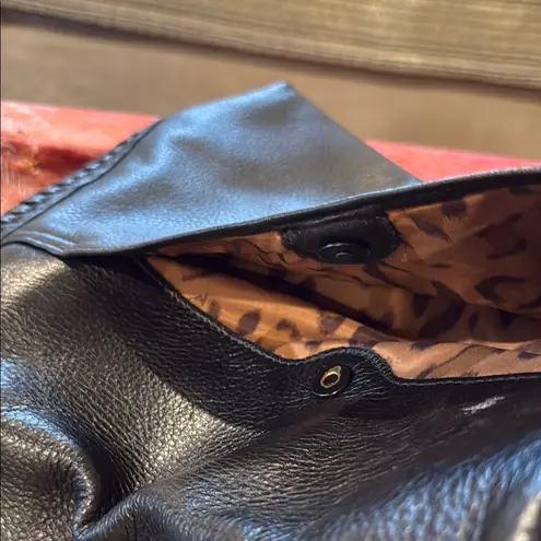 Aimee Kestenberg Black Crossbody Bag with Adjustable Strap and Flap Closure