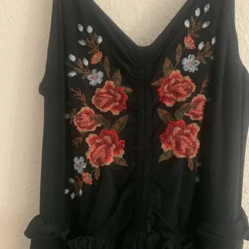 American Eagle romper | size medium | black with red flower embroidered