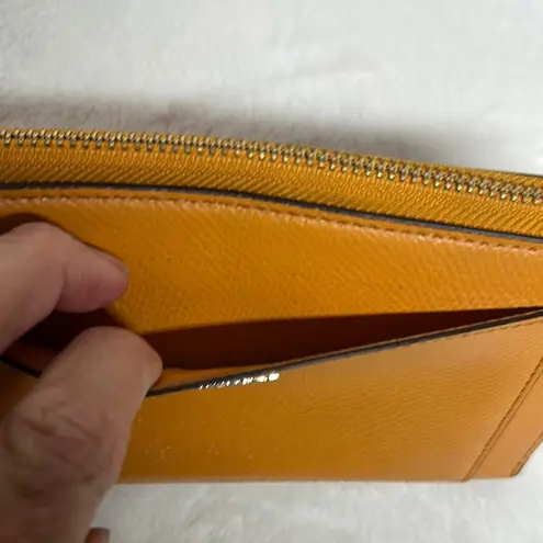 Coach  Tan/ orangish Leather Wallet