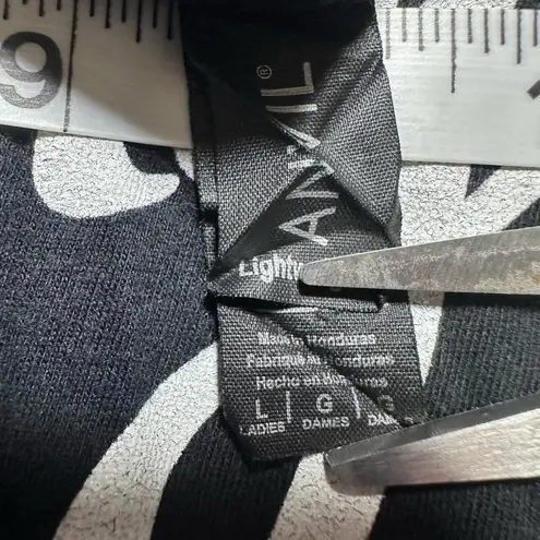 Anvil Christmas Black White Short Sleeve Graphic Tee
“I do naughty things”