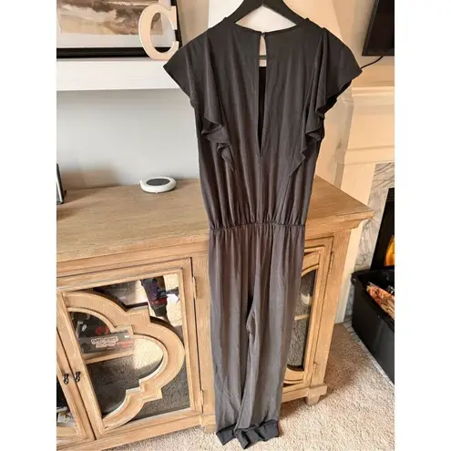 Just Female Black Jumpsuit with Ruffled Shoulder Hemline Women’s Size Small