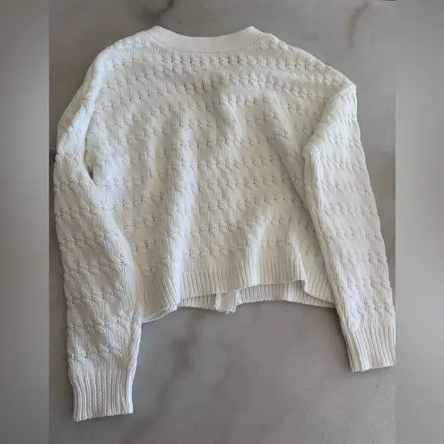Cyrus  white sweater with gold buttons size small