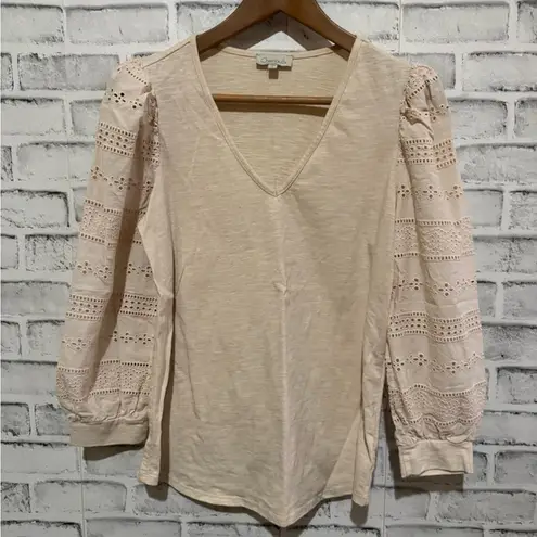 Women’s Chenault peachy cream colored eyehole puff sleeve shirt Small