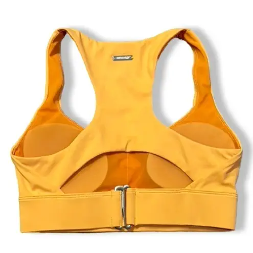 DOYOUEVEN Crop racerback sports bra athletic bra in the color gold rush