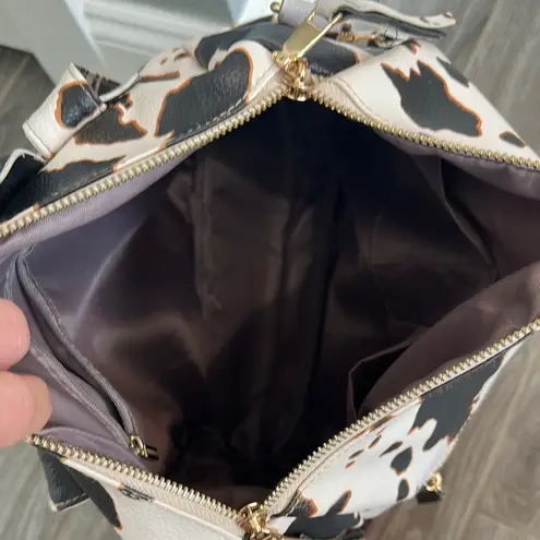 Faux leather fun Cow Print Backpack with colorful strap