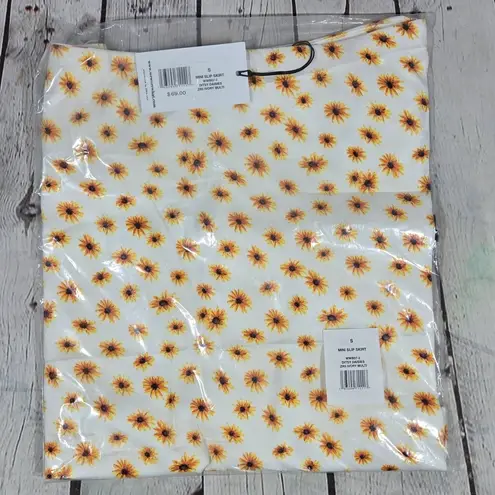 We Wore What Mini Slip Skirt in Ditsy Daisies S NWT